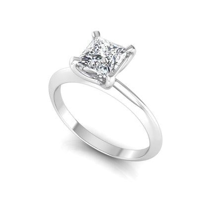 Princess cut lab grown diamond solitaire engagement ring featuring a 0.71 carat princess diamond in a classic four-prong white gold setting.