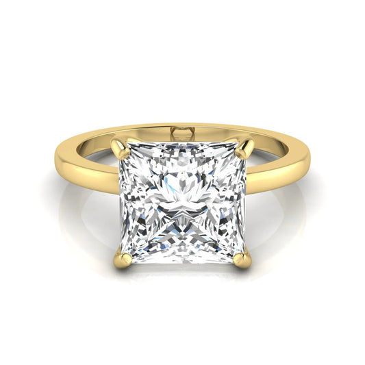 Princess cut lab grown diamond solitaire engagement ring featuring a 3.45 carat IGI certified princess diamond in a classic four-prong yellow gold setting.
