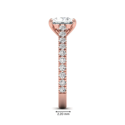 Princess cut lab grown diamond engagement ring with pavé round diamonds in a rose gold four-prong setting