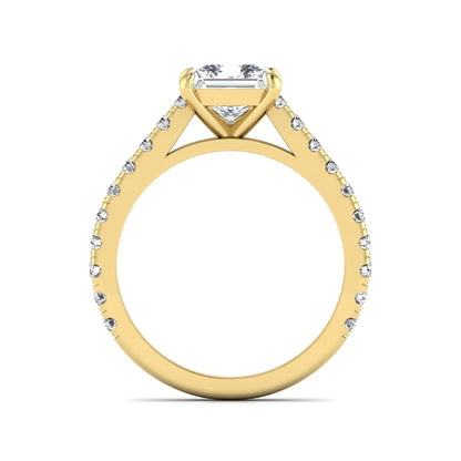 Princess cut lab grown diamond engagement ring with pavé round diamonds in a yellow gold four-prong setting