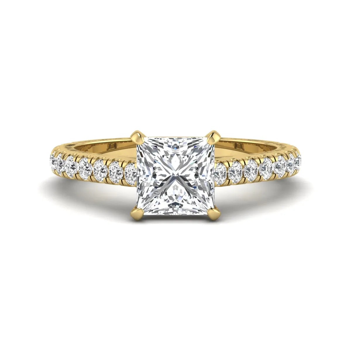Princess cut lab grown diamond engagement ring with pavé round diamonds in a yellow gold four-prong setting