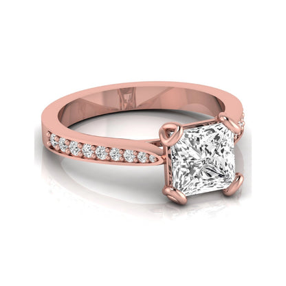 Princess cut lab grown diamond solitaire engagement ring featuring a four-prong setting with a pavé diamond band in rose gold tone.