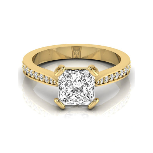 Princess cut lab grown diamond solitaire engagement ring featuring a four-prong setting with a pavé diamond band in yellow gold tone.