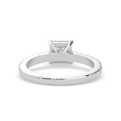 princess cut lab grown diamond prong set engagement ring with pavé band and white gold metal tone design