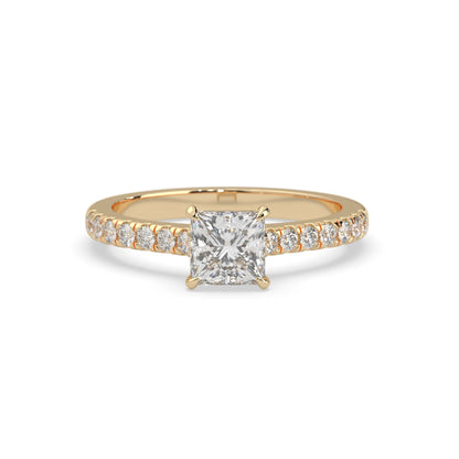 princess cut lab grown diamond prong set engagement ring with pavé band and yellow gold metal tone design