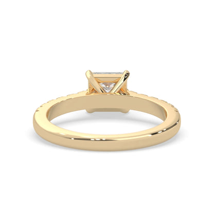 princess cut lab grown diamond prong set engagement ring with pavé band and yellow gold metal tone design