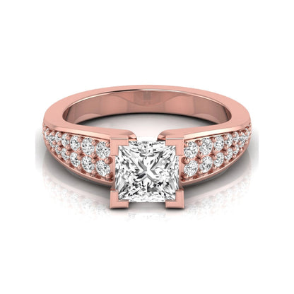 Princess cut lab grown diamond engagement ring with round side accent diamonds and four-prong setting in rose gold style.