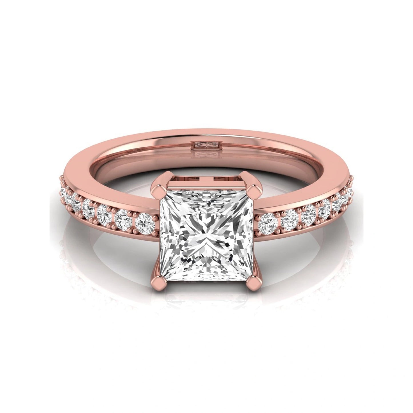 Princess cut lab grown diamond engagement ring featuring a four-prong solitaire setting with a pavé accent band and polished rose gold tone finish.