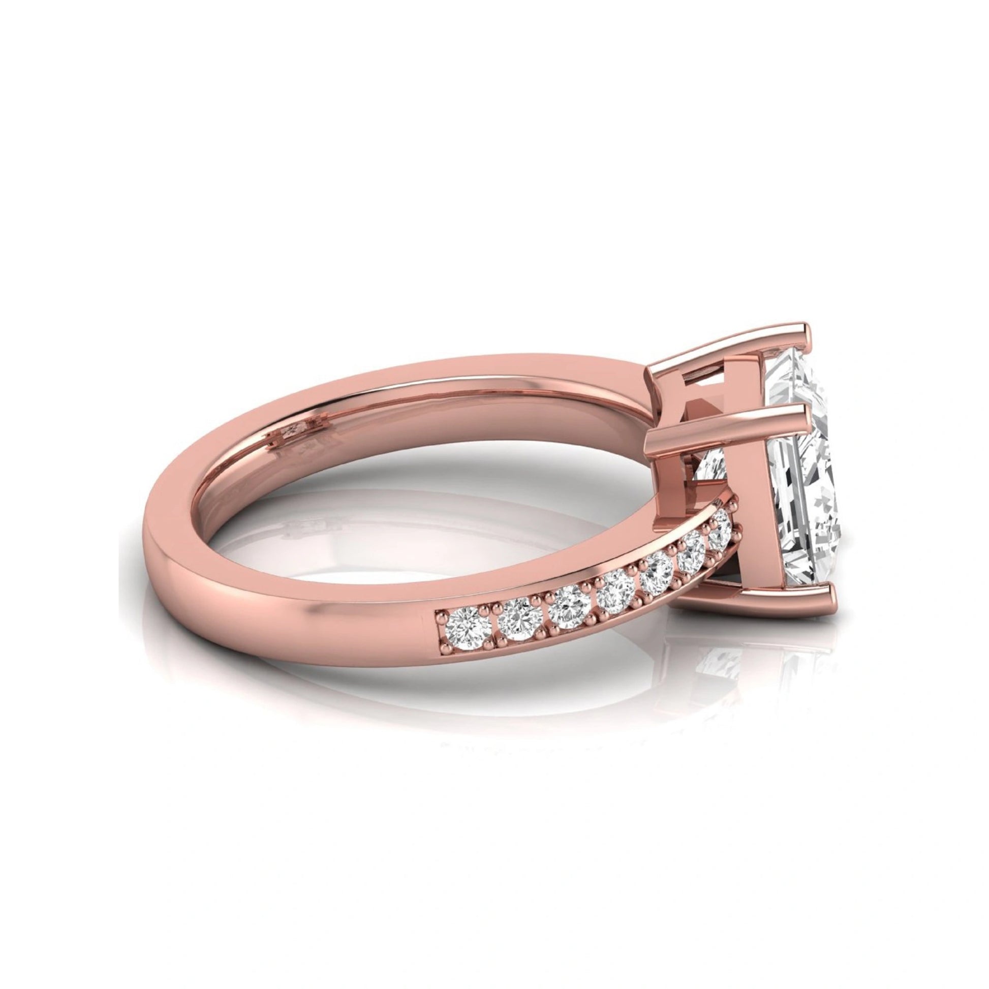 Princess cut lab grown diamond engagement ring featuring a four-prong solitaire setting with a pavé accent band and polished rose gold tone finish.