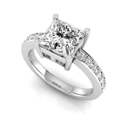 Princess cut lab grown diamond engagement ring featuring a four-prong solitaire setting with a pavé accent band and polished white gold tone finish.