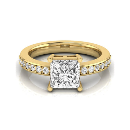 Princess cut lab grown diamond engagement ring featuring a four-prong solitaire setting with a pavé accent band and polished yellow gold tone finish.