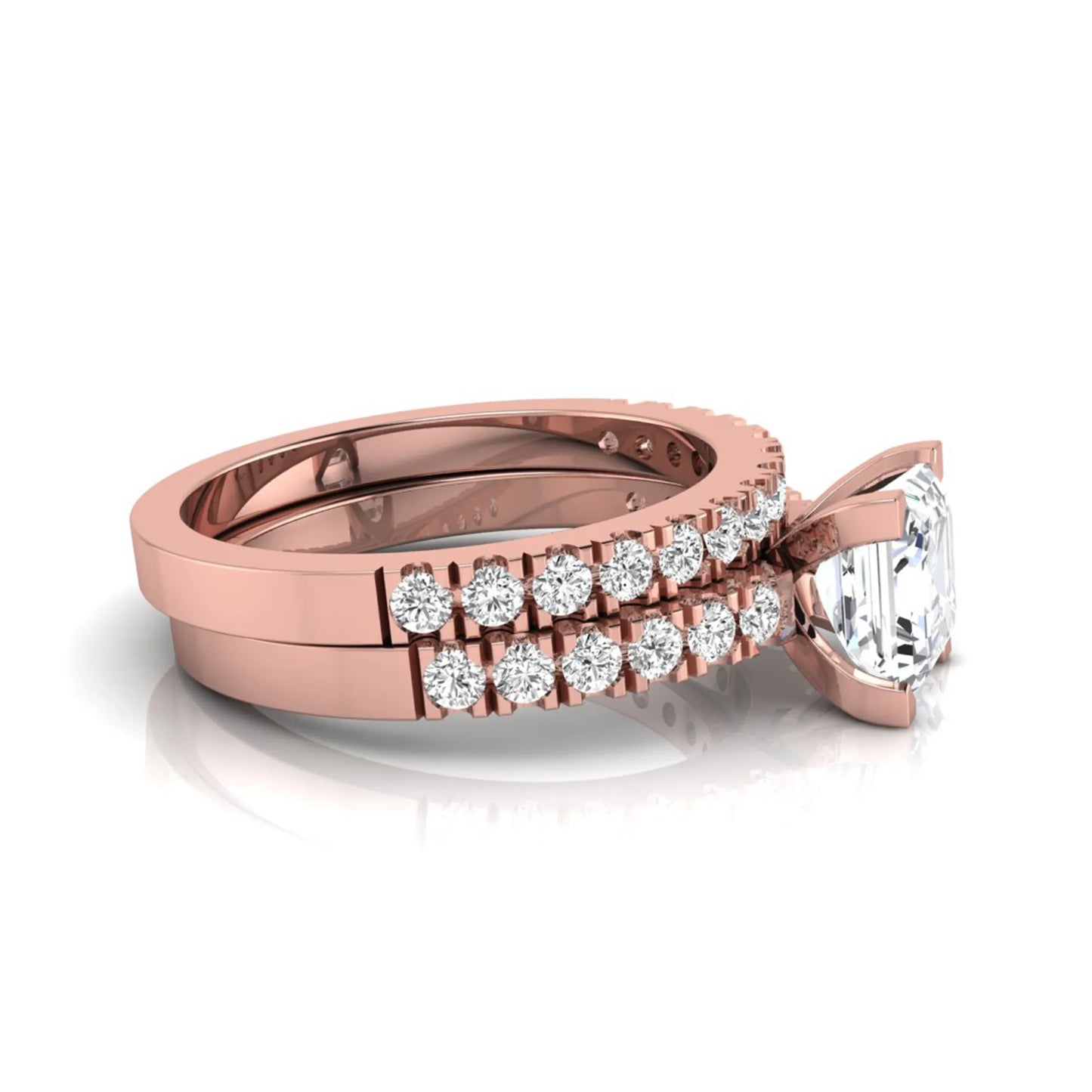 Princess cut lab grown diamond solitaire bridal ring set featuring a four-prong engagement ring with a matching pavé diamond wedding band in rose gold.