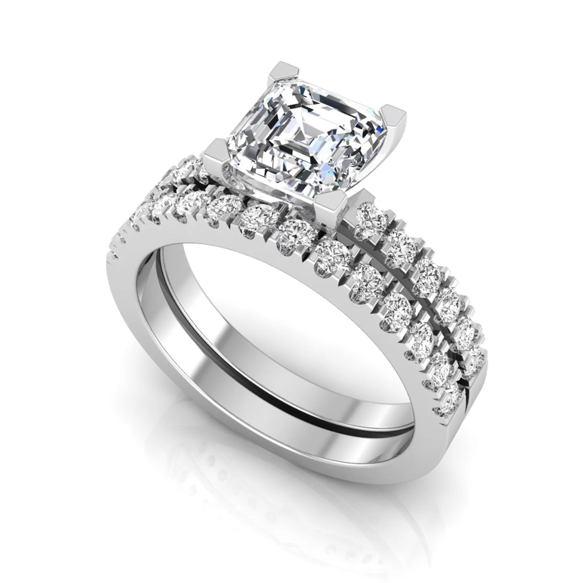 Princess cut lab grown diamond solitaire bridal ring set featuring a four-prong engagement ring with a matching pavé diamond wedding band in white gold.