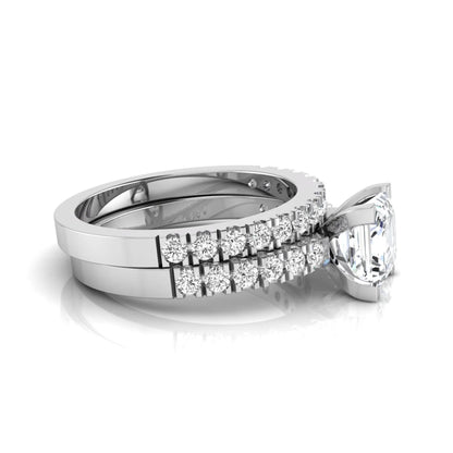 Princess cut lab grown diamond solitaire bridal ring set featuring a four-prong engagement ring with a matching pavé diamond wedding band in white gold.