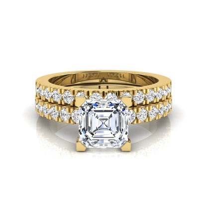 Princess cut lab grown diamond solitaire bridal ring set featuring a four-prong engagement ring with a matching pavé diamond wedding band in yellow gold.