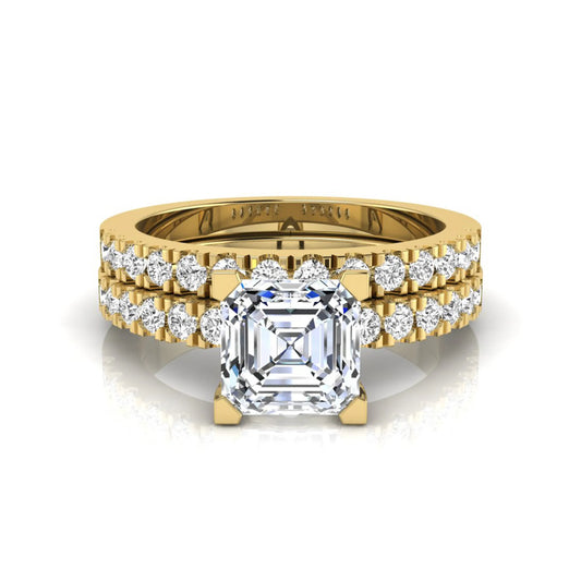 Princess cut lab grown diamond solitaire bridal ring set featuring a four-prong engagement ring with a matching pavé diamond wedding band in yellow gold.