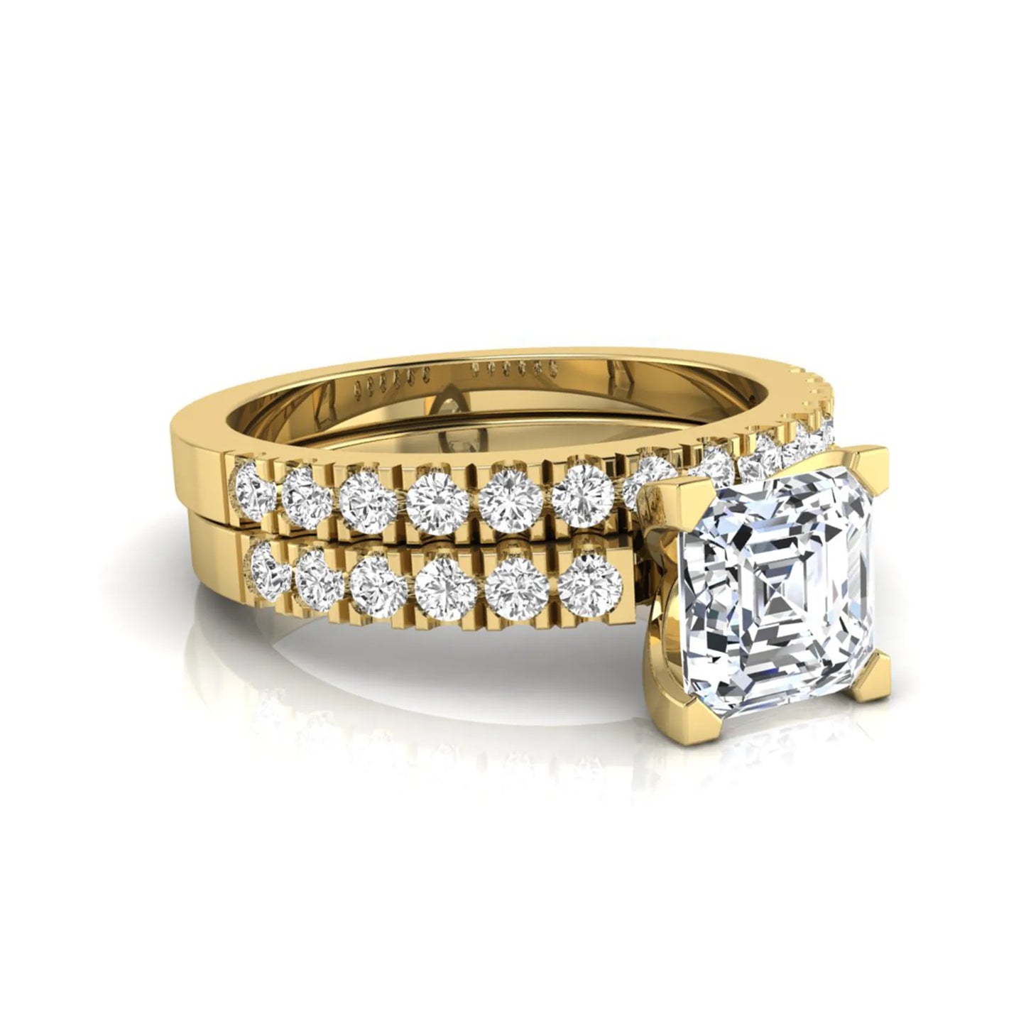 Princess cut lab grown diamond solitaire bridal ring set featuring a four-prong engagement ring with a matching pavé diamond wedding band in yellow gold.