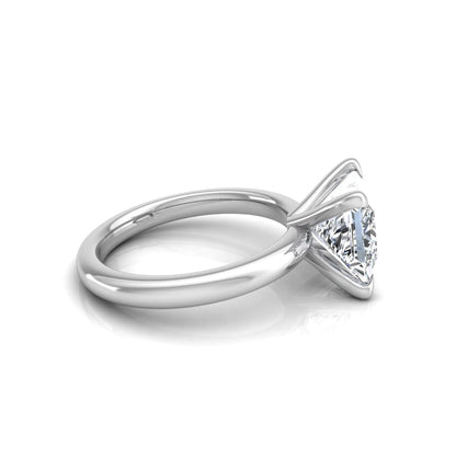 Princess cut lab grown diamond engagement ring featuring a 1.96 carat center diamond in a classic four-prong cathedral solitaire setting with a polished white gold tone band.