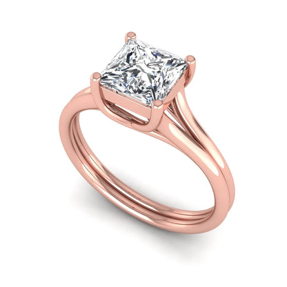 IGI Certified 1.25 carat princess cut lab grown diamond solitaire engagement ring with elegant split shank band in rose gold.