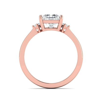 Princess cut lab grown diamond three stone engagement ring featuring a four-prong center diamond with princess cut side stones in rose gold.