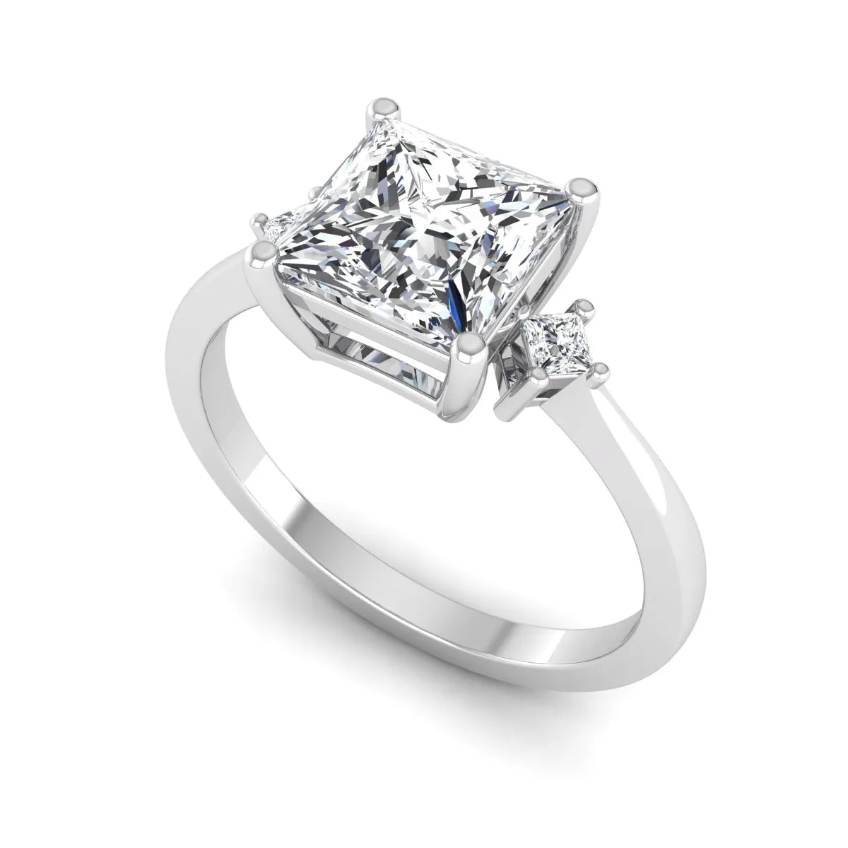 Princess cut lab grown diamond three stone engagement ring featuring a four-prong center diamond with princess cut side stones in white gold.