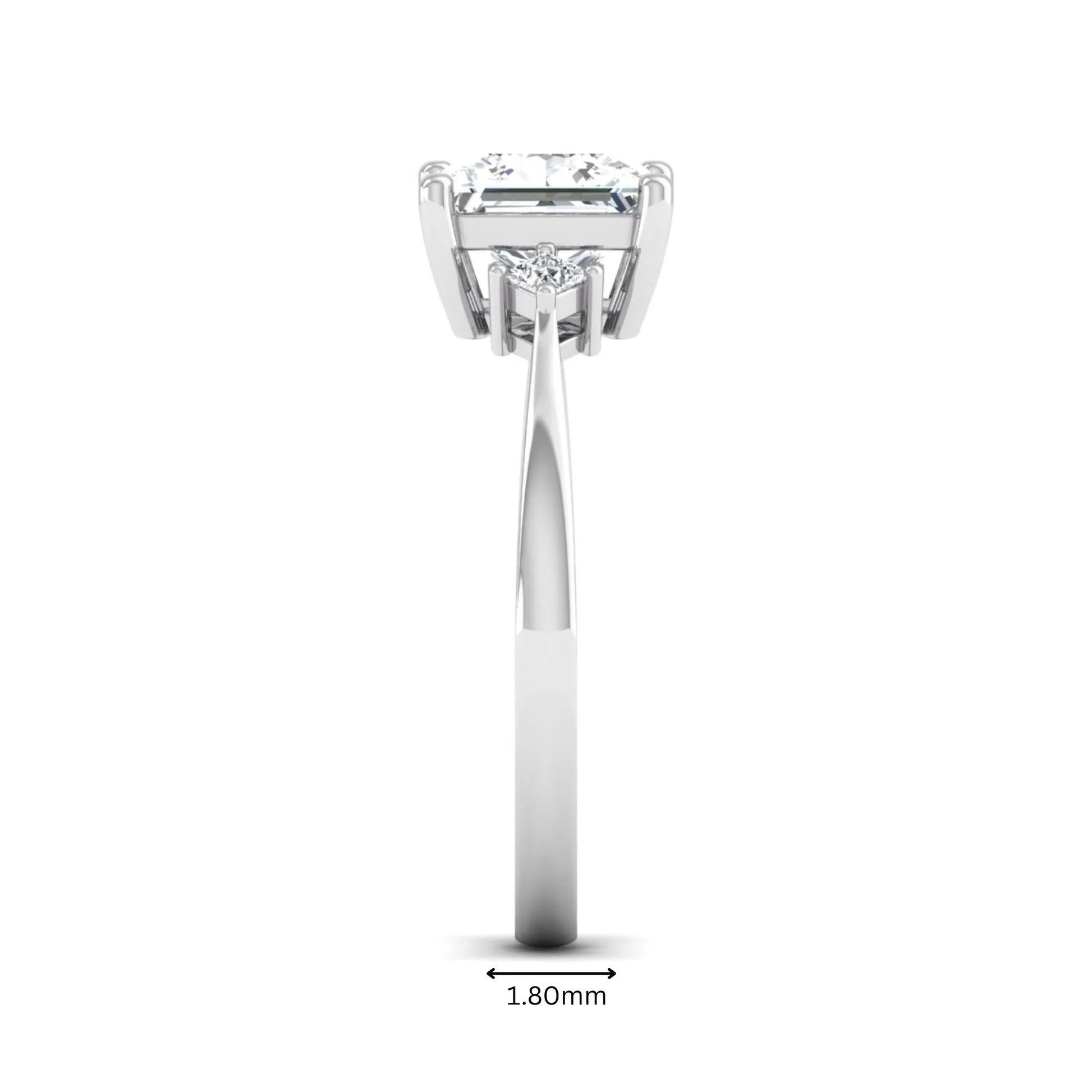 Princess cut lab grown diamond three stone engagement ring featuring a four-prong center diamond with princess cut side stones in white gold.