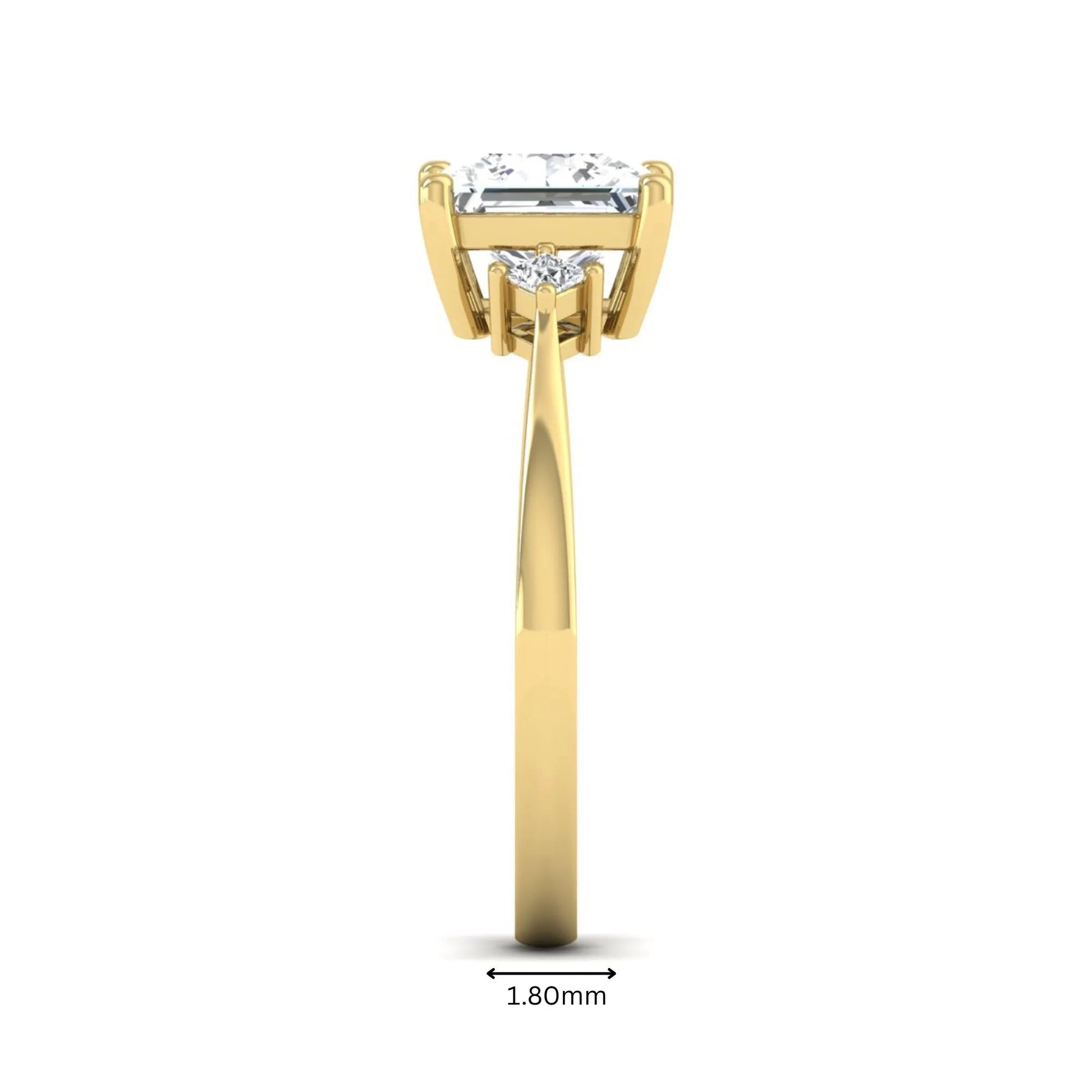 Princess cut lab grown diamond three stone engagement ring featuring a four-prong center diamond with princess cut side stones in yellow gold.