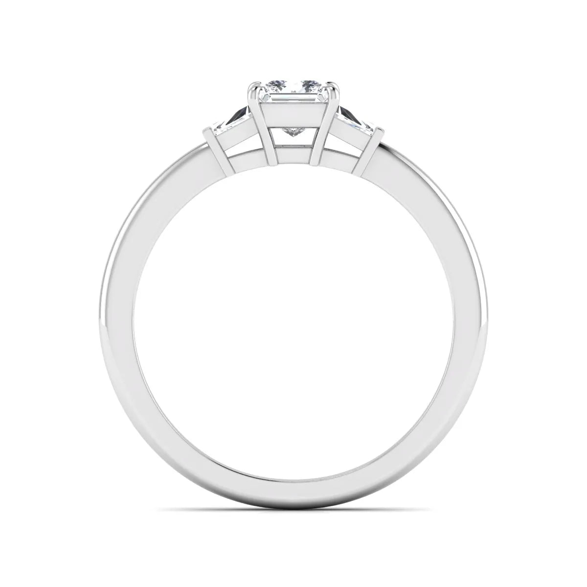 Princess cut lab grown diamond three stone engagement ring with tapered baguette side diamonds in a four-prong setting and white gold tone band.