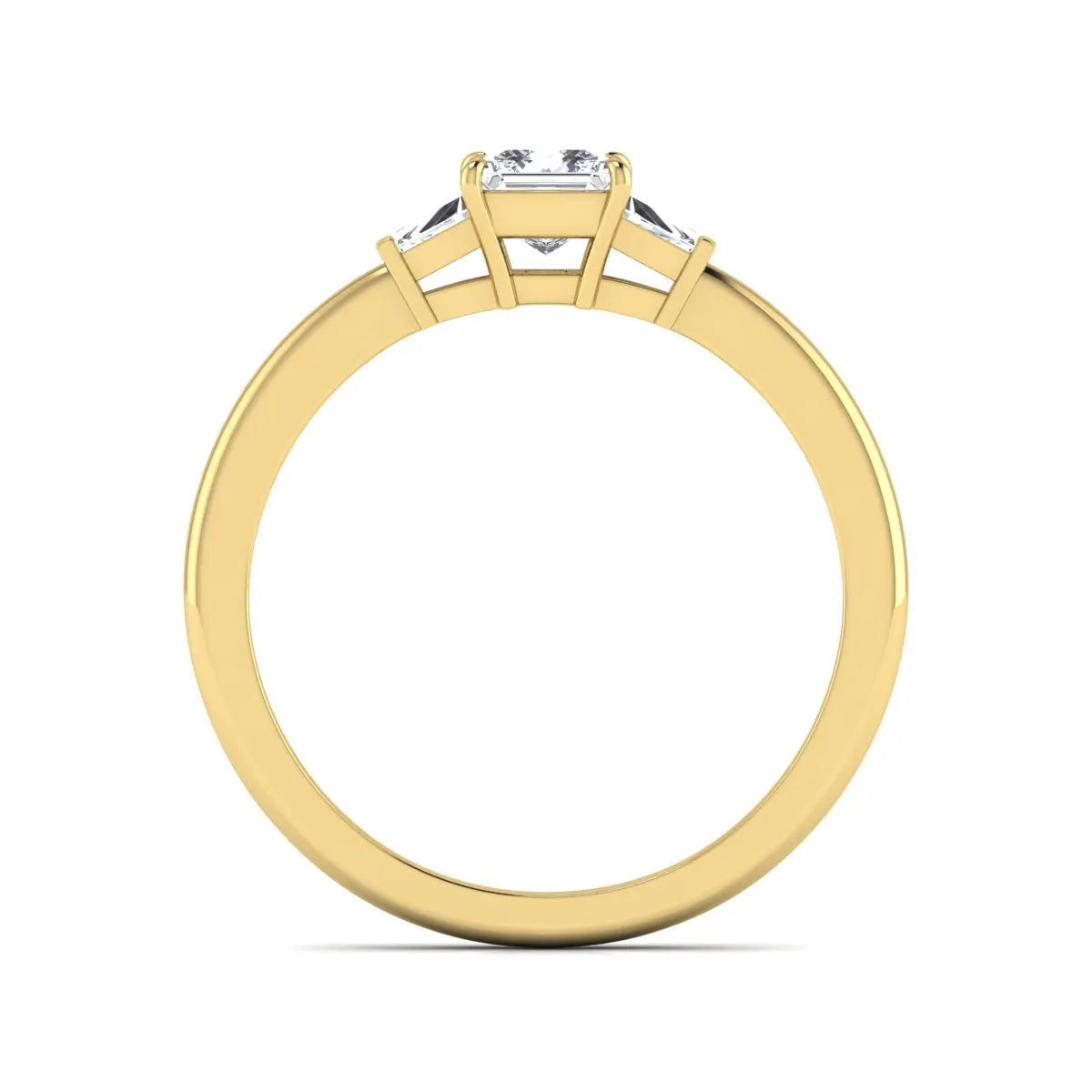 Princess cut lab grown diamond three stone engagement ring with tapered baguette side diamonds in a four-prong setting and yellow gold tone band.