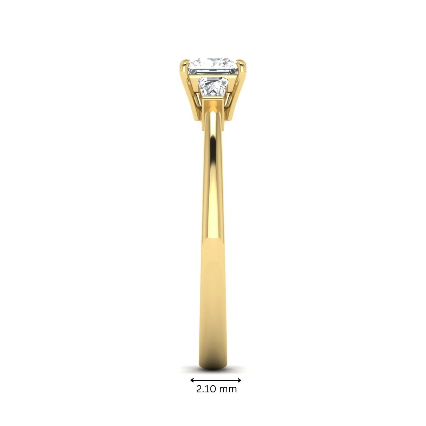 Princess cut lab grown diamond three stone engagement ring with tapered baguette side diamonds in a four-prong setting and yellow gold tone band.