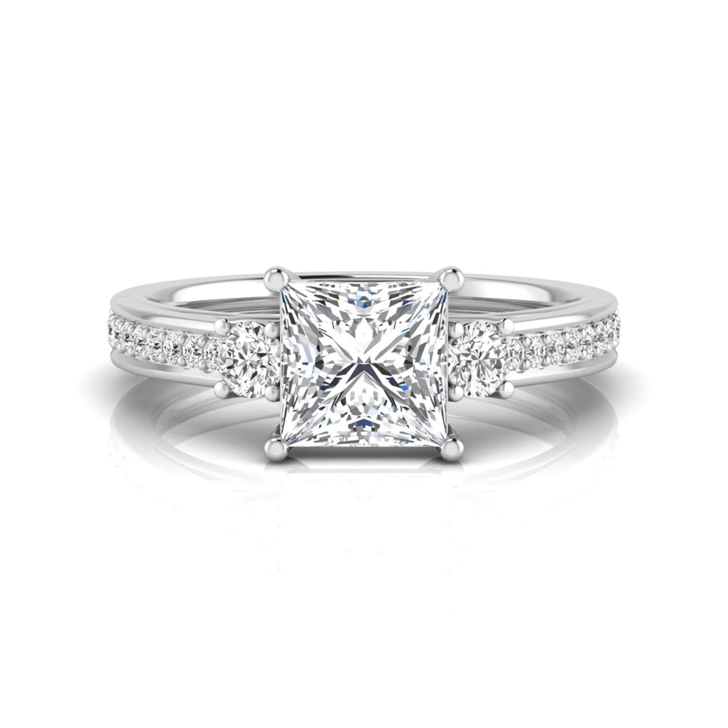 Princess cut three stone lab grown diamond engagement ring featuring a princess center diamond, round side diamonds, and pavé band in White metal tone.