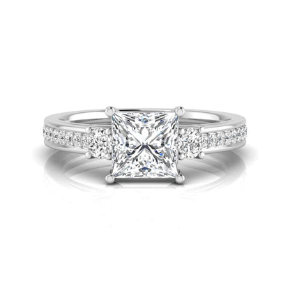 Princess cut three stone lab grown diamond engagement ring featuring a princess center diamond, round side diamonds, and pavé band in White metal tone.