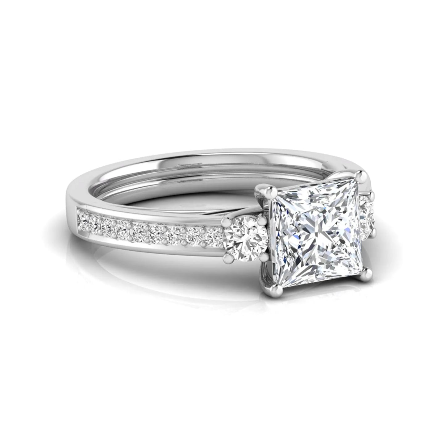 Princess cut three stone lab grown diamond engagement ring featuring a princess center diamond, round side diamonds, and pavé band in White metal tone.
