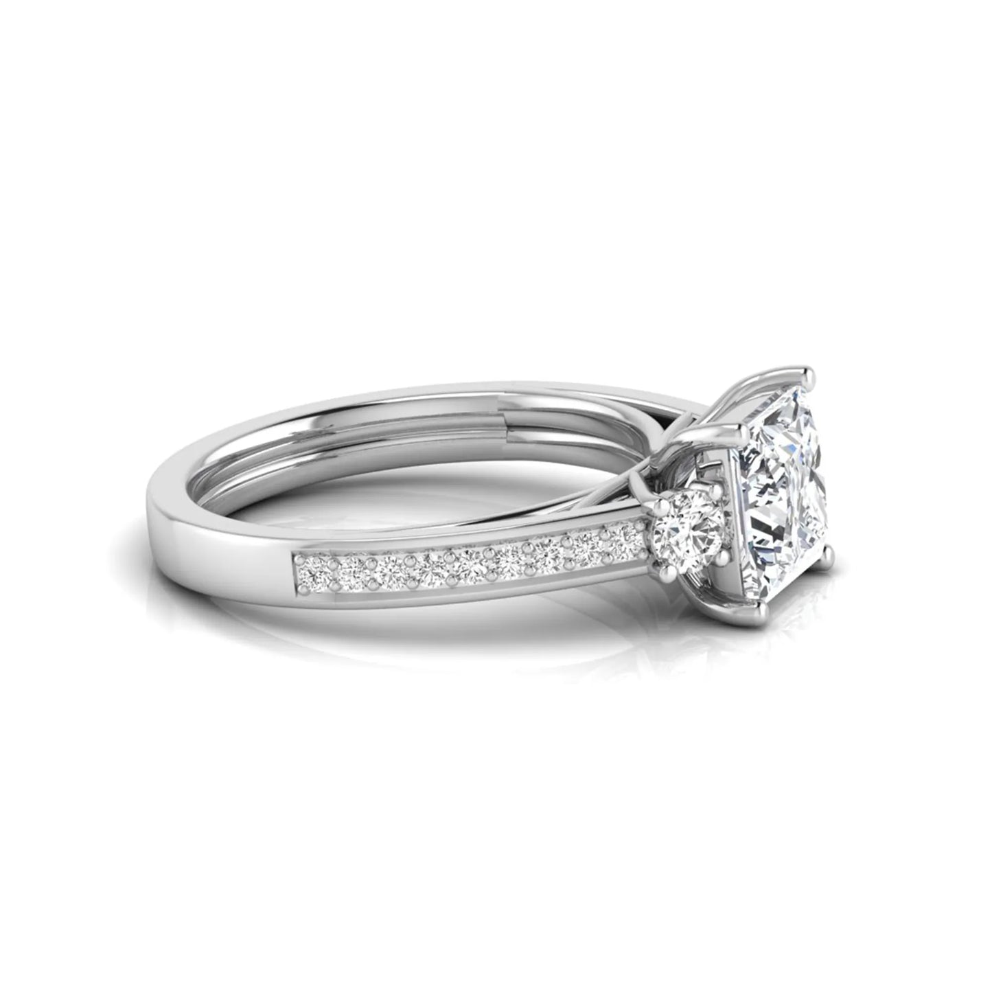 Princess cut three stone lab grown diamond engagement ring featuring a princess center diamond, round side diamonds, and pavé band in White metal tone.