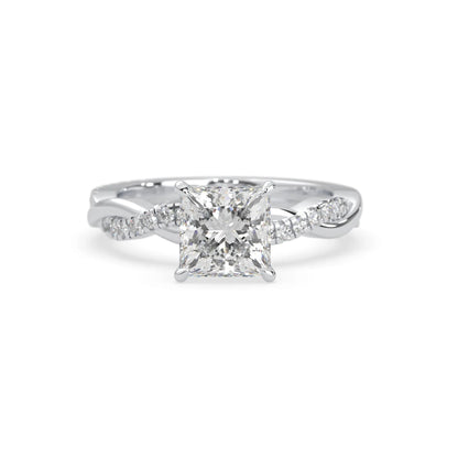 Princess brilliant lab grown diamond engagement ring with prong setting and twisted pavé diamond band in white gold tone