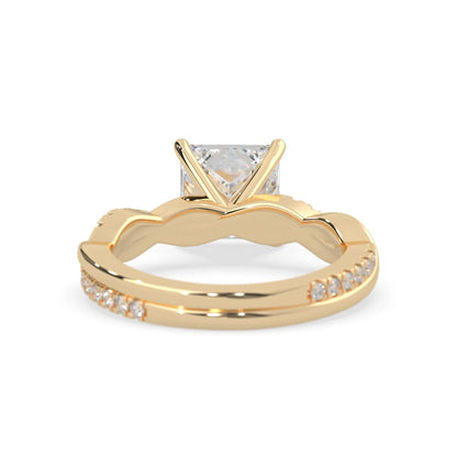 Princess brilliant lab grown diamond engagement ring with prong setting and twisted pavé diamond band in yellow gold tone