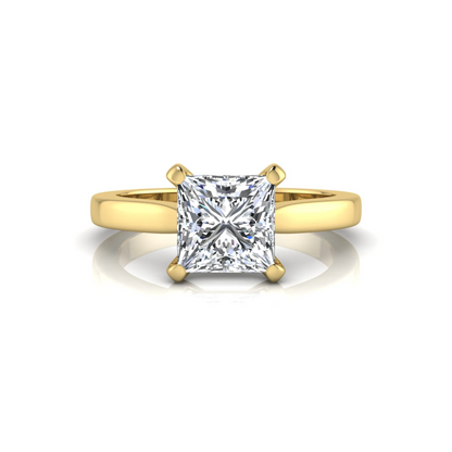 yellow-Gold ring with a square-cut diamond on a white background