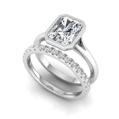 Radiant cut bezel set lab grown diamond bridal ring set with pavé contour band and white gold metal tone.