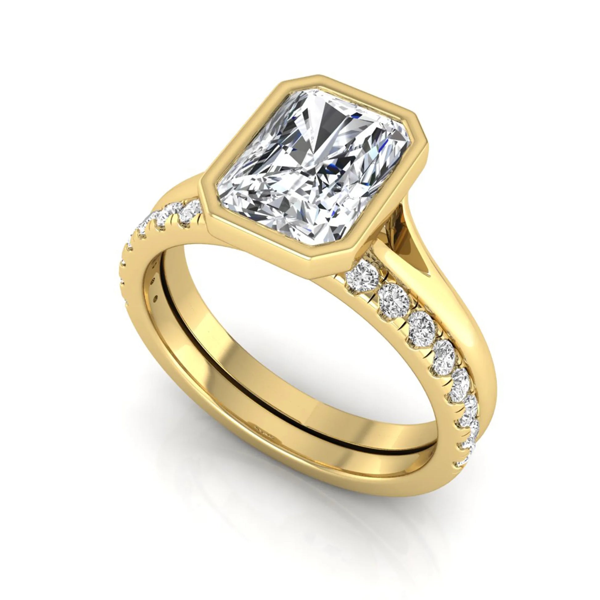 Radiant cut bezel set lab grown diamond bridal ring set with pavé contour band and white gold metal tone.