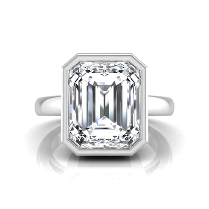 Radiant cut bezel set lab grown diamond solitaire engagement ring with a white gold tone band featuring an IGI certified center diamond.
