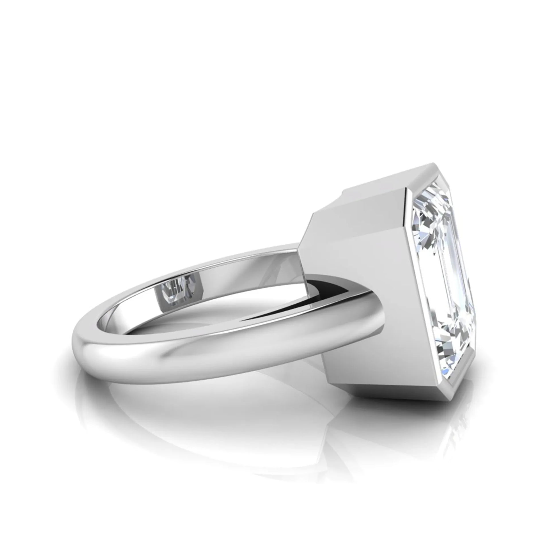 Radiant cut bezel set lab grown diamond solitaire engagement ring with a white gold tone band featuring an IGI certified center diamond.