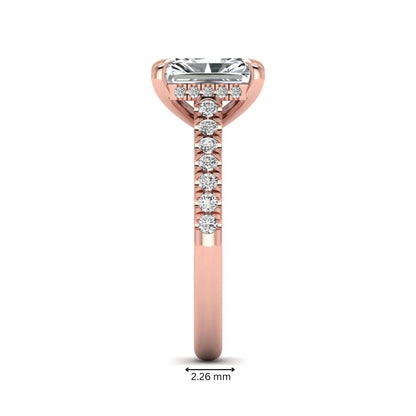 Radiant cut lab grown diamond hidden halo engagement ring with pavé diamond band and cathedral setting in rose gold.