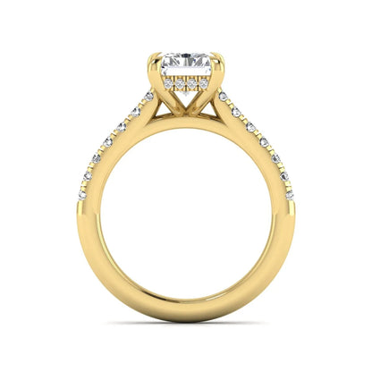 Radiant cut lab grown diamond hidden halo engagement ring with pavé diamond band and cathedral setting in yellow gold.