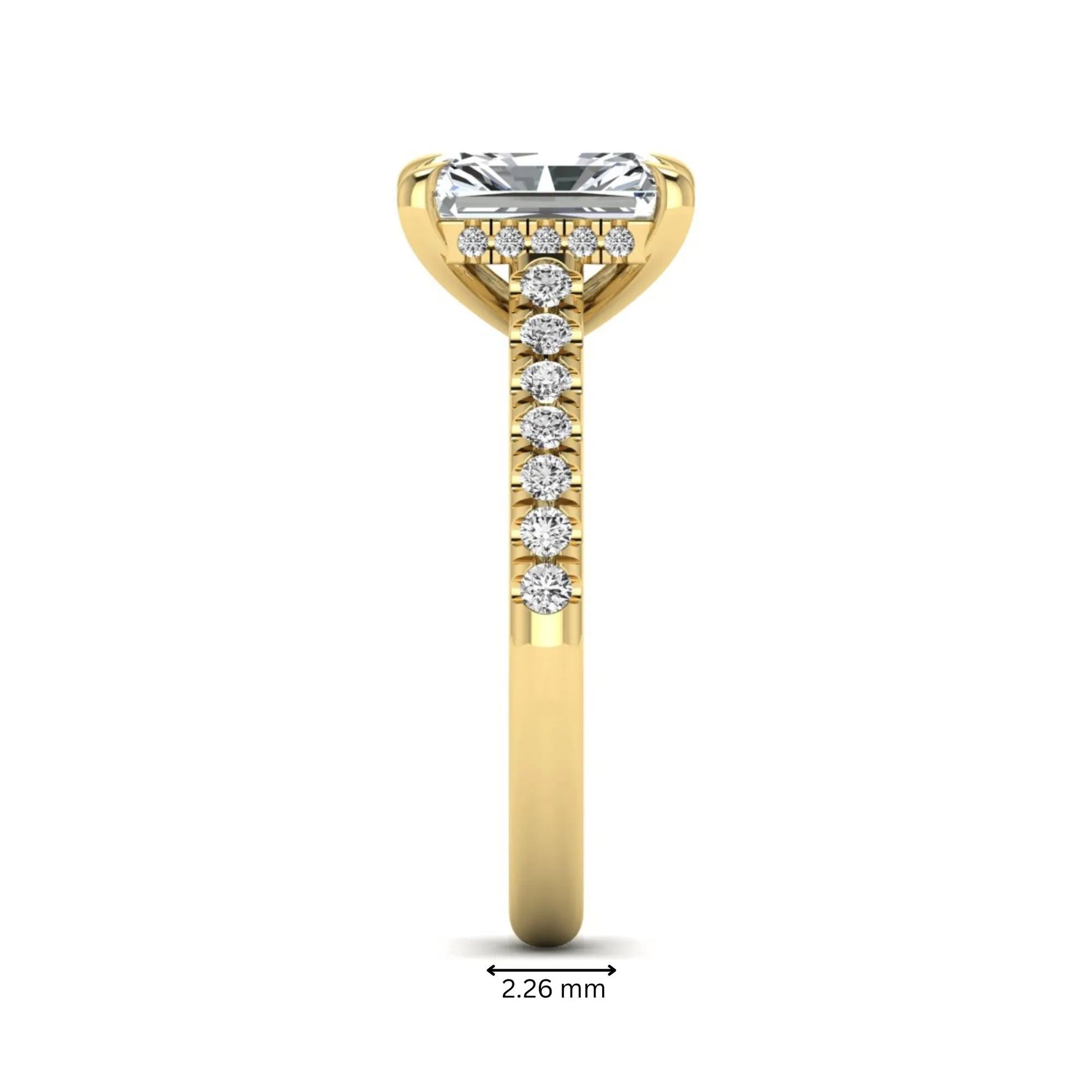 Radiant cut lab grown diamond hidden halo engagement ring with pavé diamond band and cathedral setting in yellow gold.