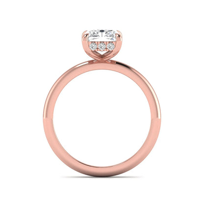 IGI certified radiant cut lab grown diamond hidden halo solitaire engagement ring in rose gold with a four-prong setting.