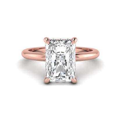 IGI certified radiant cut lab grown diamond hidden halo solitaire engagement ring in rose gold with a four-prong setting.