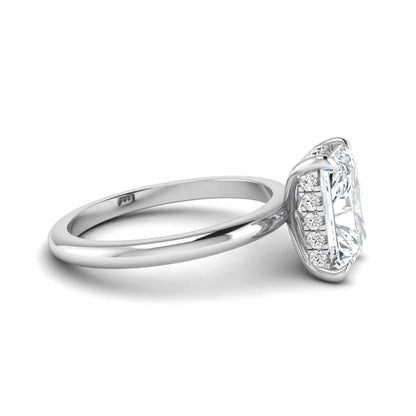 IGI certified radiant cut lab grown diamond hidden halo solitaire engagement ring in white gold with a four-prong setting.
