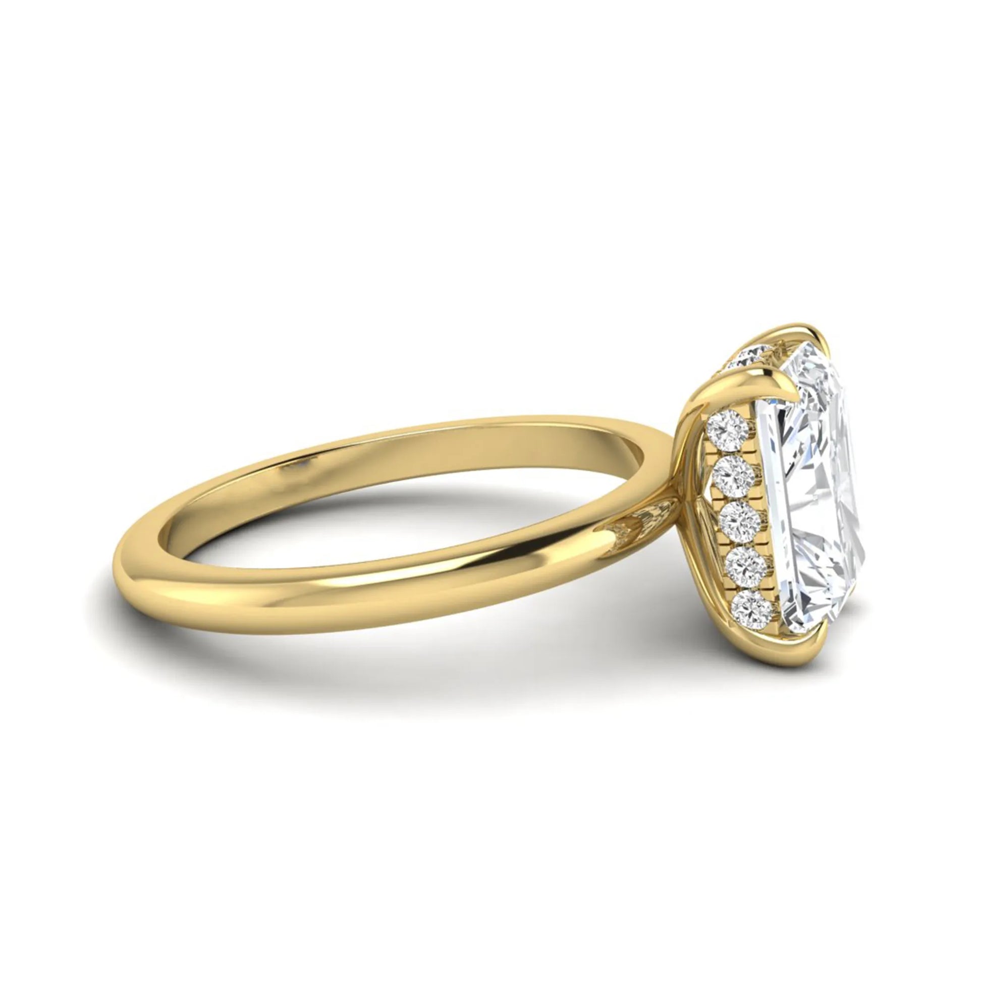 IGI certified radiant cut lab grown diamond hidden halo solitaire engagement ring in yellow gold with a four-prong setting.