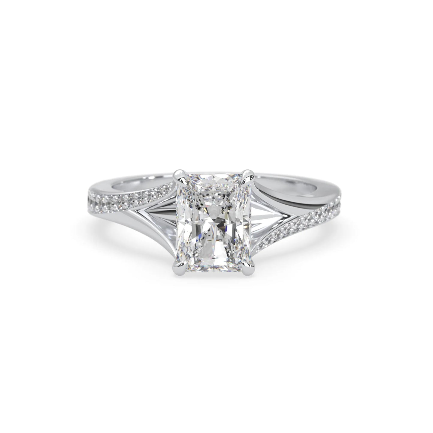 white gold emerald lab grown diamond engagement ring on a white background