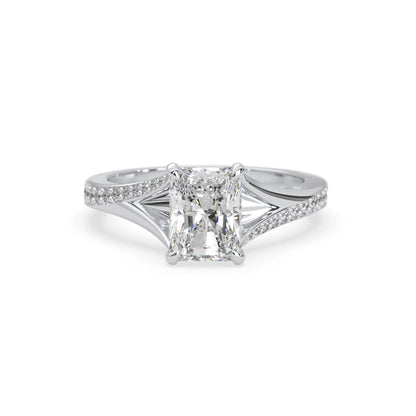 white gold emerald lab grown diamond engagement ring on a white background